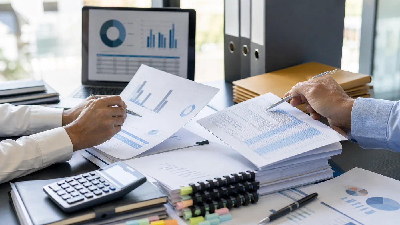 Accounting and Audit Coordination - Accounting and audit coordination documents on a professional desk